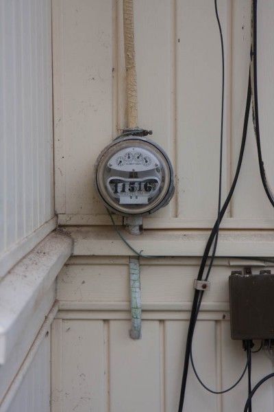 This is how the old electrical service entrance looked, just a round bucket with this super old meter in it.