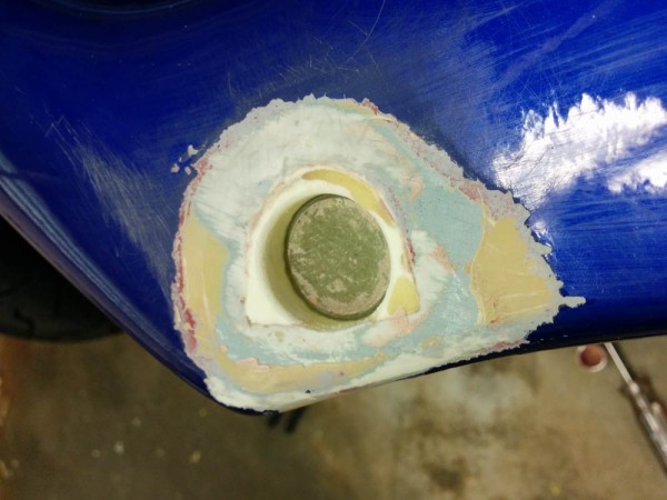After I removed the Bondo mold and the aluminum pipe that created the shape for the screw hole, I was left  with this.