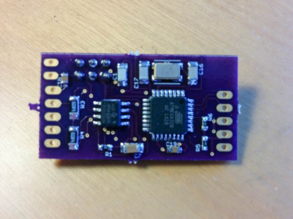 The back side of the relay board. The large chip is the Atmega 328 and the small one the CAN-bus transceiver. 