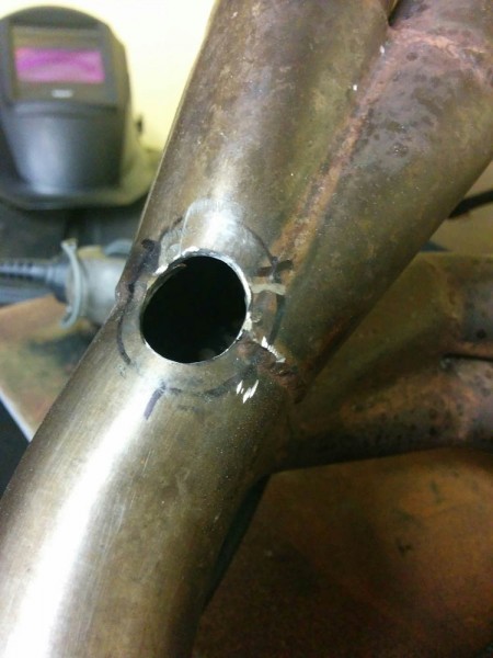The hole is mostly done. Getting through the stainless was a chore.