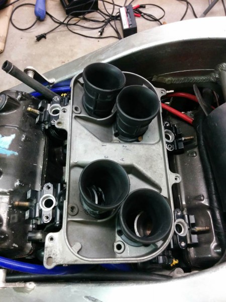 This is the airbox bottom that the throttle bodies will need to mount to. The carbs are hard-mounted to this bracket.