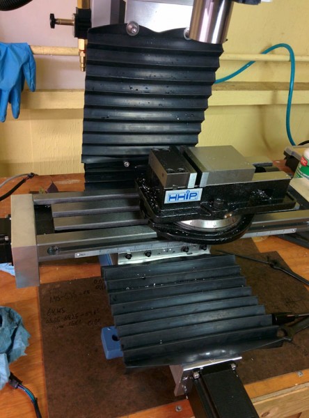 The machine with the added Z-axis chip guard and improved attachment of the Y-axis ones.