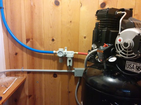 This is the 60-gallon Husky in its closet, with a new, larger filter/regulator.