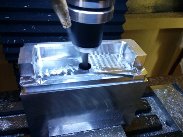 This is a short bit into the machining of the inside of the compressor intake adapter.