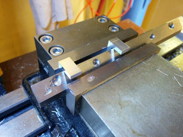 The ruined gib would be my test case. Here it's mounted in the vise using the fixtures that hold it at the correct angle.